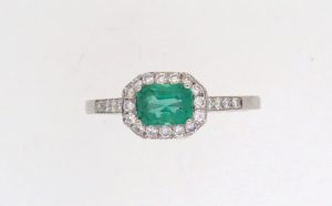 Pre Owned Emerald And Diamond Cluster ring